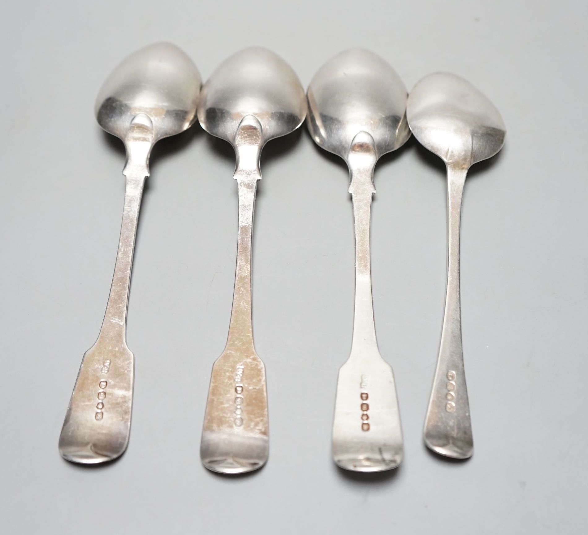 A set of three George IV silver tablespoons, by William Bateman, London, 1822 and a later silver dessert spoon, 231 grams.